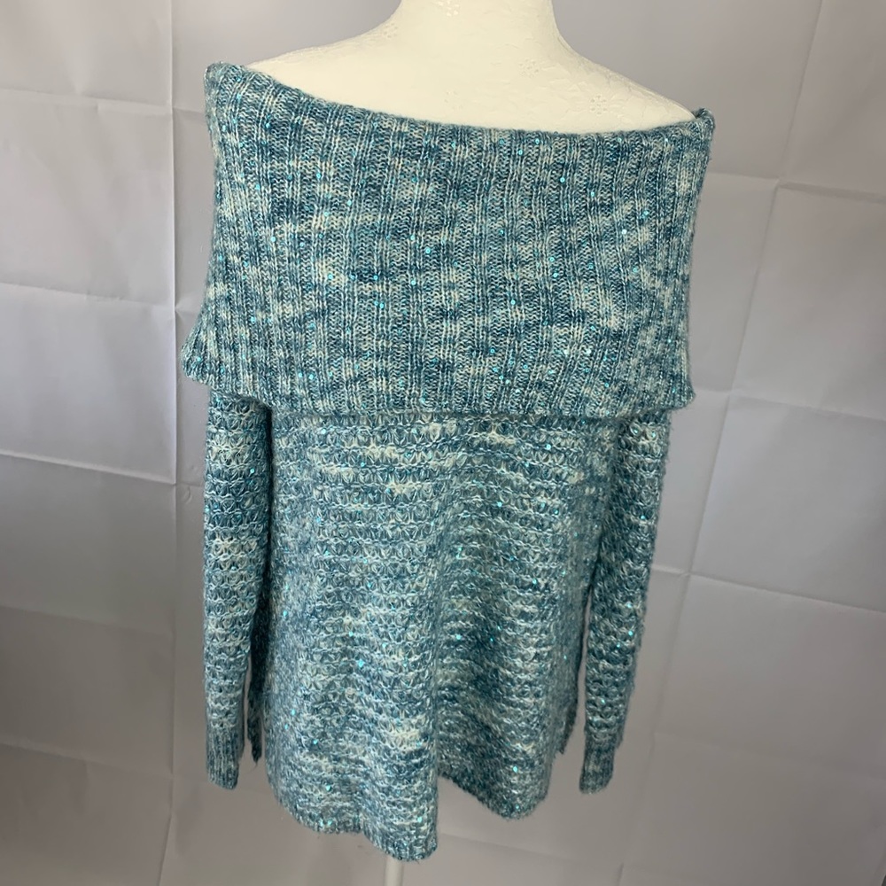 Sweater color light blue, turtleneck .